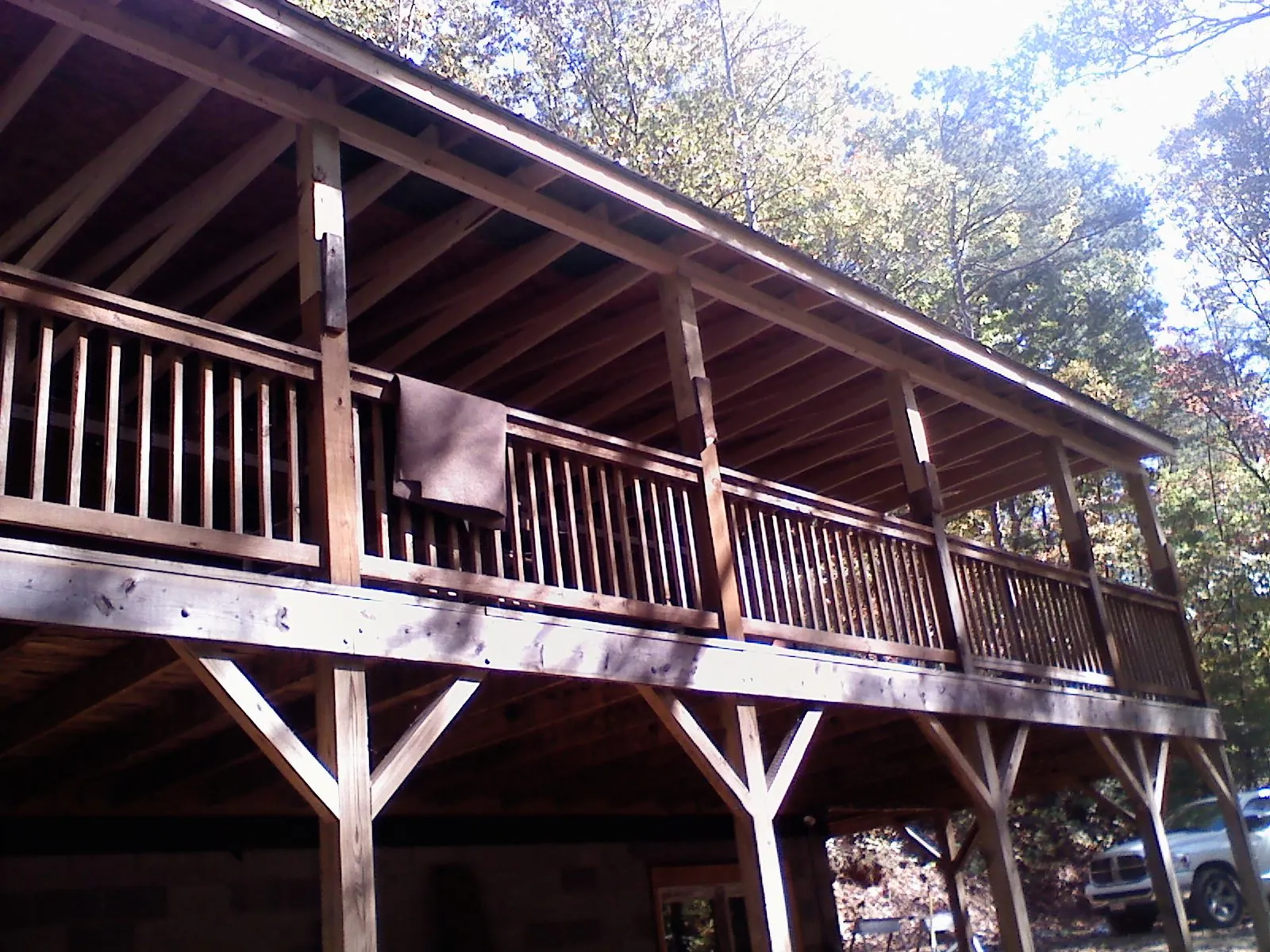 Timber framing under a new elevated porch and deck — Roof Leak Repair in Lake Villa by Roofing Brothers